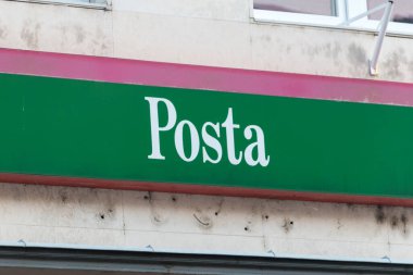 Nyiregyhaza, Hungary - June 11, 2022: Logo of Hungarian Post (Magyar Posta) on post office.