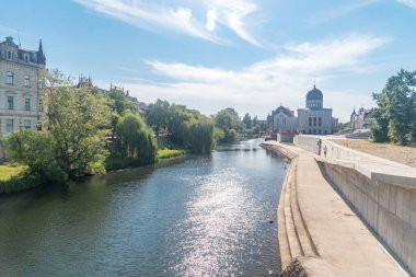 Oradea, Romania - June 10, 2022: Crisul Repede river in city center of Oradea.