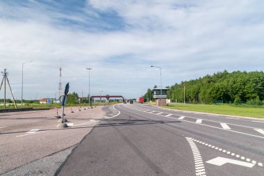 Ainazi, Latvia - June 19, 2022: Entrance road into Latvia.