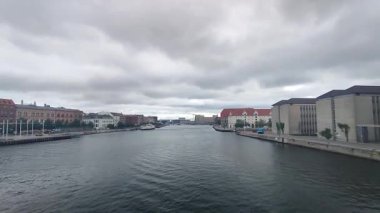 Copenhagen, Denmark - July 26, 2022: Copenhagen view from Knippels Bridge at cloudy day.