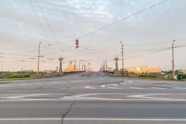 Riga, Latvia - June 20, 2022: Morning view on Stone Bridge (Akmens tilts) over Daugava river.