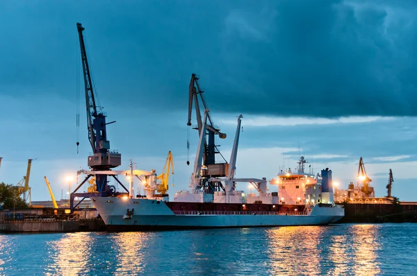 Shipyard with ship at dusk time — Stock Photo, Image