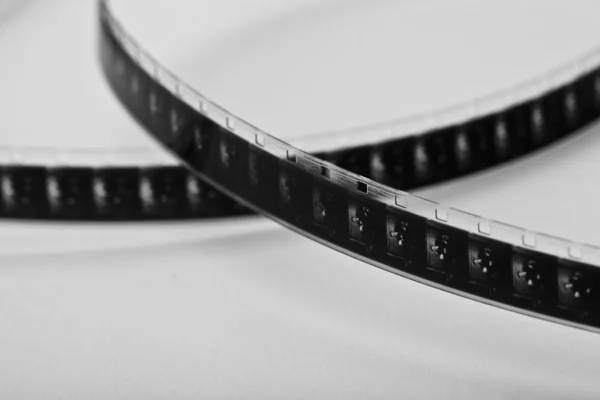 Carrete de película fotográfica tira de película negativa antigua tira de película 8mm carrete de película agujero de fuego de cine — Foto de Stock
