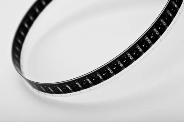 Foto foto film reel antieke negatieve film strip film strip 8mm film reel bioscoop brand gat — Stockfoto