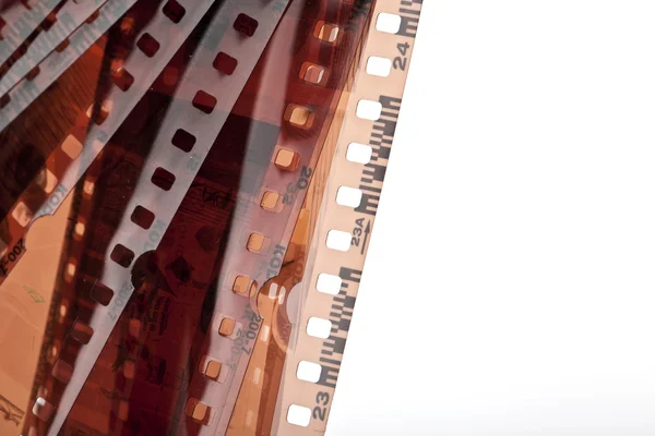 Carrete de película fotográfica tira de película negativa antigua tira de película 8mm carrete de película agujero de fuego de cine — Foto de Stock