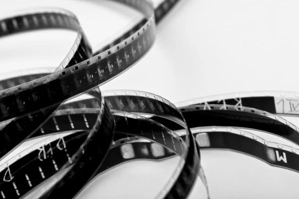 Фотопленка катушка антикварная негативная лента лента лента лента 8 мм кинокатушка кинотеатр огненная дыра — стоковое фото