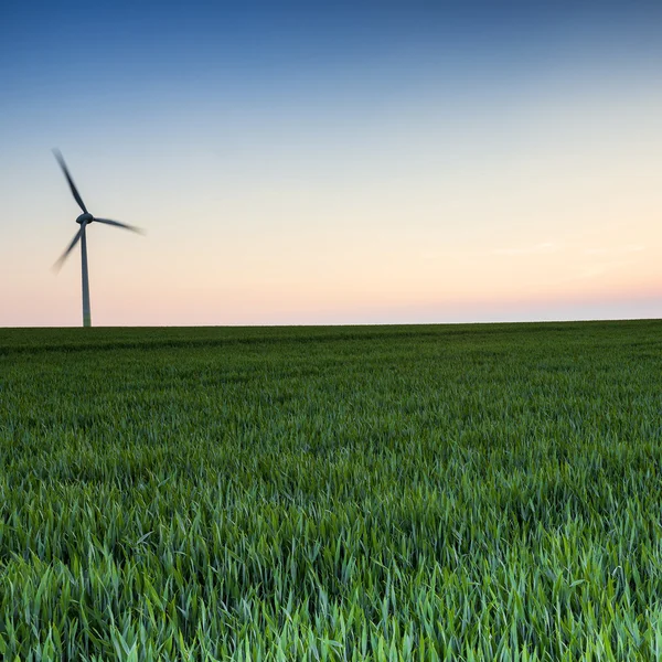 Sunset windmill wind power turbine Twilight current renewable energy economy eco bio — Stock Photo, Image