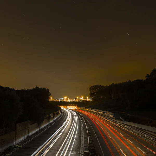 Long time exposure freeway cruising car light trails streaks of light speed highway Aix-la-Chapelle — Stock Photo, Image