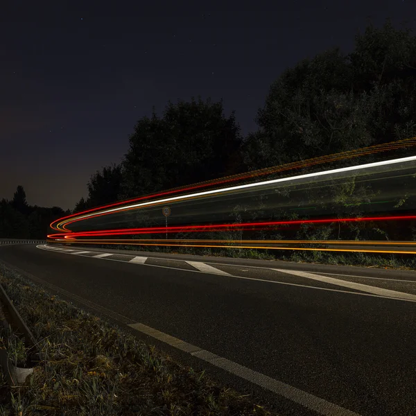 Long time exposure freeway cruising car light trails streaks of light speed highway Aix-la-Chapelle — Stock Photo, Image