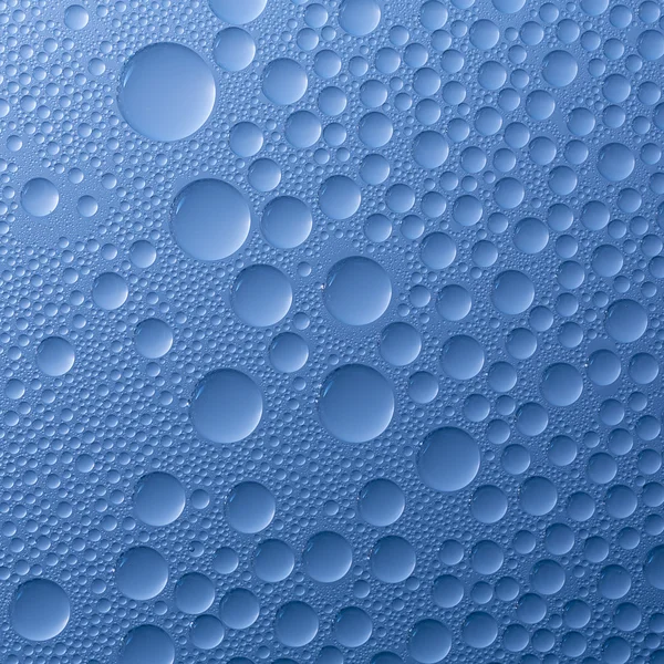 Water drops beading nano effect tau lotuseffekt blue sealer repels rain deflector — Stock Photo, Image