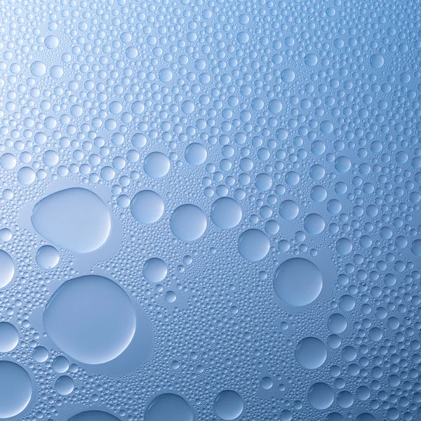 Waterdruppels beading nano effect tau lotuseffekt blauwe sealer stoot regen deflector — Stockfoto