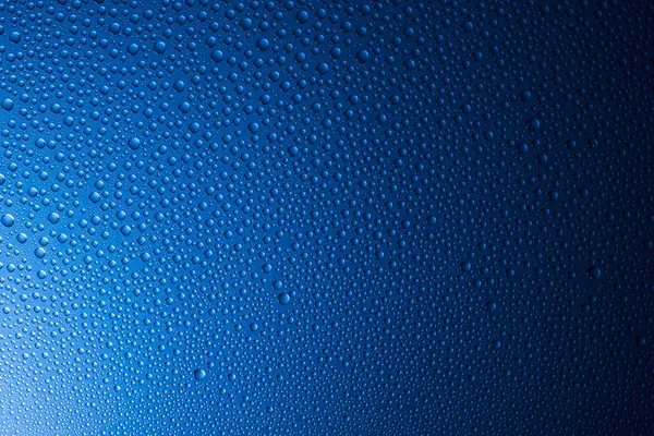 Waterdruppels beading nano effect tau lotuseffekt blauwe sealer stoot regen deflector — Stockfoto