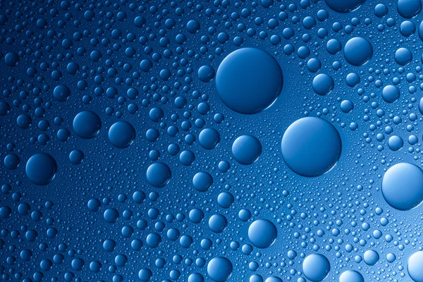 Water drop dew drop effect nano effect lotuseffekt blue impregnation repels rain deflector — Stock Photo, Image