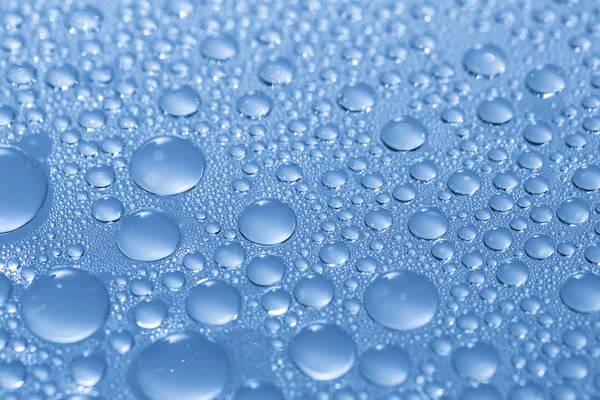 Water drops beading nano effect tau lotuseffekt blue sealer repels rain deflector — Stock Photo, Image