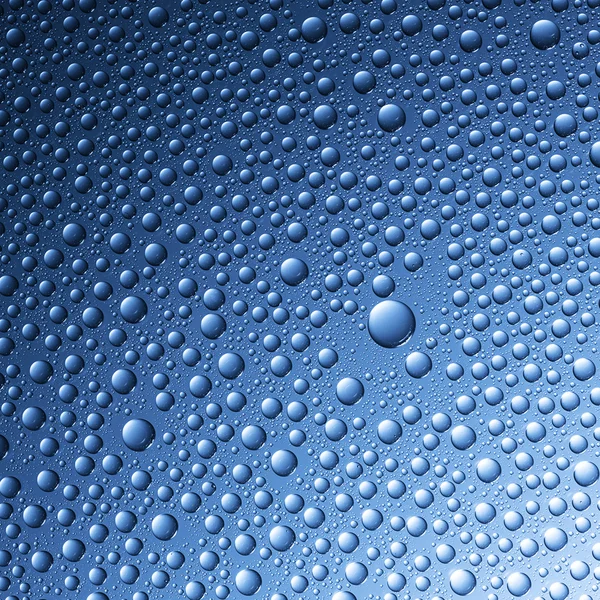 Gotas de agua rebordeando efecto nano tau lotuseffekt sellador azul repele deflector de lluvia —  Fotos de Stock