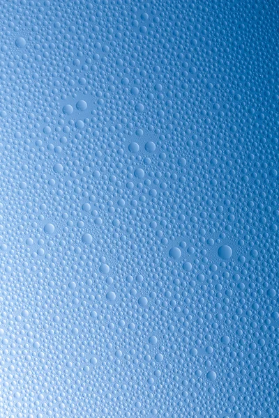 Water drops beading nano effect tau lotuseffekt blue sealer repels rain deflector — Stock Photo, Image