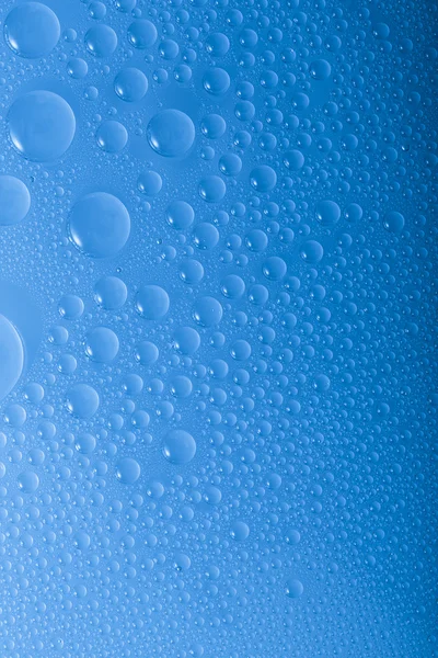 Water drops beading nano effect tau lotuseffekt blue sealer repels rain deflector — Stock Photo, Image