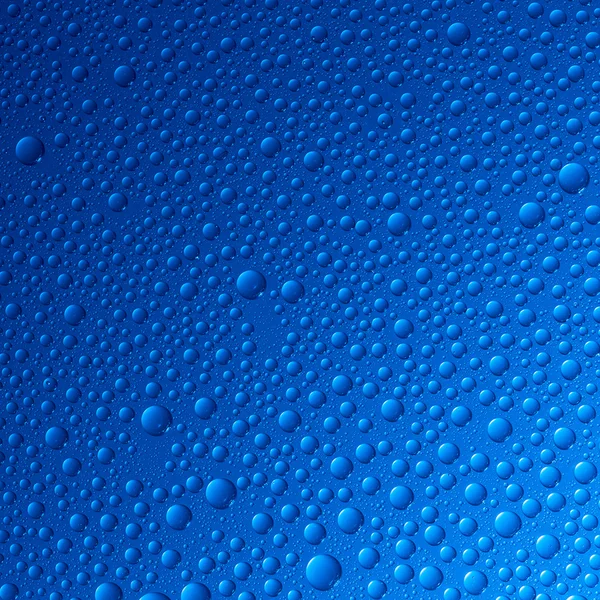 Gyöngyfűzés nano hatás tau lotuseffekt kék sealer taszítja a vízcseppek eső terelőlap — Stock Fotó