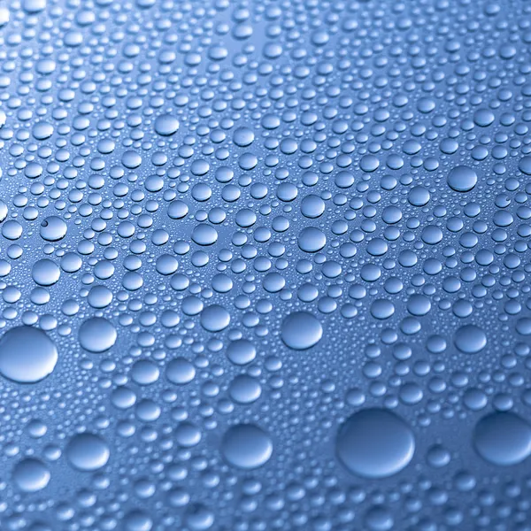 Water drops beading nano effect tau lotuseffekt blue sealer repels rain deflector — Stock Photo, Image