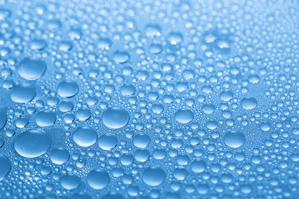 Water drop dew drop effect nano effect lotuseffekt blue impregnation repels rain deflectorÄnderungen — Stock Photo, Image
