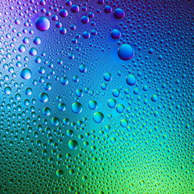 Water drops spectral colors blue purple green gradient rainbow colorful beading lotuseffekt tau sealing