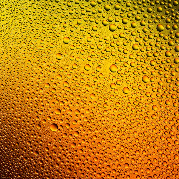 Waterdrops gradiente espectral laranja amarelo ouro cores arco-íris colorido beading lotuseffekt tau selagem — Fotografia de Stock