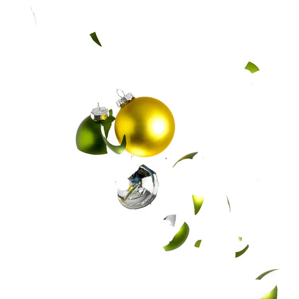 Christmas ball christmas tree gold yellow green ornament decoration impact explosion shattered — Stock Photo, Image
