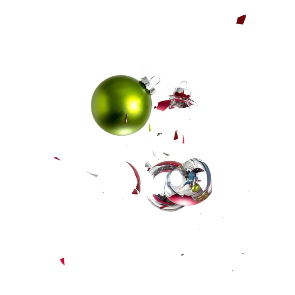 Christmas ball christmas tree green red ornament decoration impact explosion shattered — Stock Photo, Image