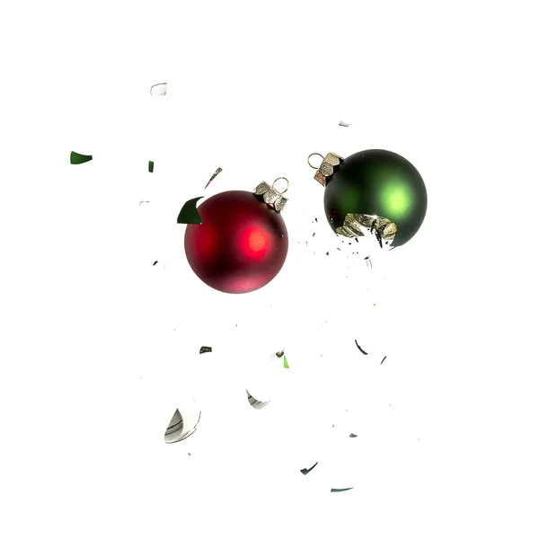 Christmas ball christmas tree green red ornament decoration impact explosion shattered — Stock Photo, Image