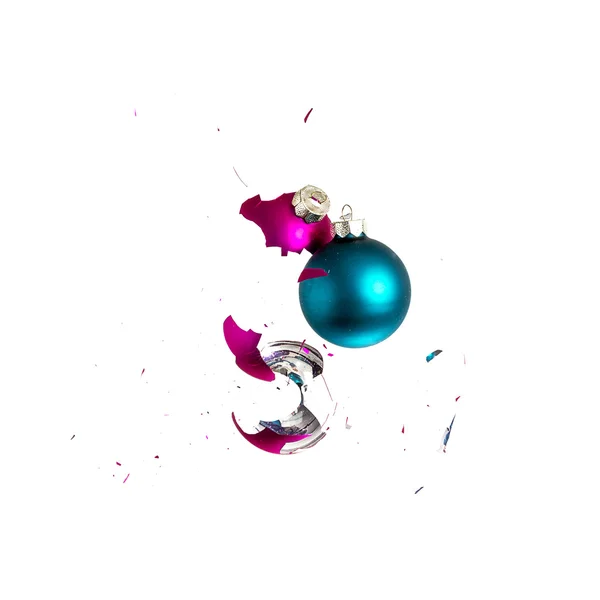 Christmas ball christmas tree ornament decoration impact blue pink explosion shattered — Stock Photo, Image