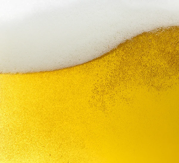 Öl beerfoam beerglass guld skum krona skum våg oktoberfest alkohol bryggeriet restaurang pils — Stockfoto