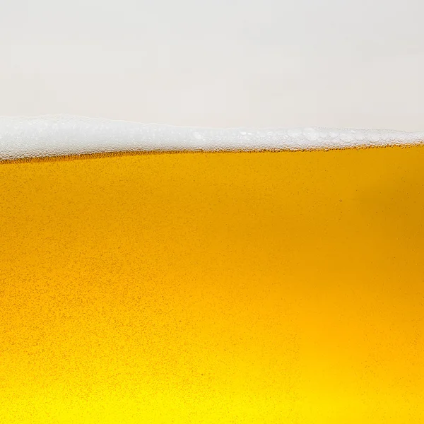 Piwo beerfoam beerglass złota pianka korony pianki fala oktoberfest alkohol browar restauracja pils — Zdjęcie stockowe