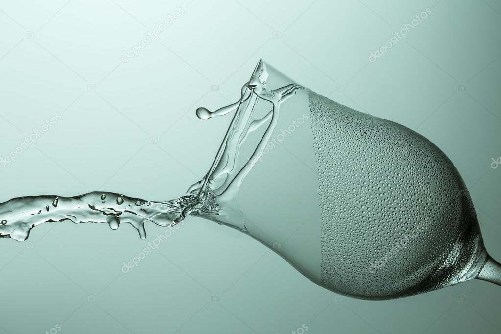 Wine glass of water splash rinse hygienic glass splatter dew drop shod cool drinking water