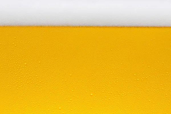 Öl dagg droppen öl skum glas guld krona skum våg oktoberfest kondenserande bryggeriet restaurang pils — Stockfoto