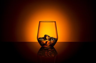 Whiskey glass ice cube drink bourbon summer sunset horizon rocks alcoholic scotland clipart