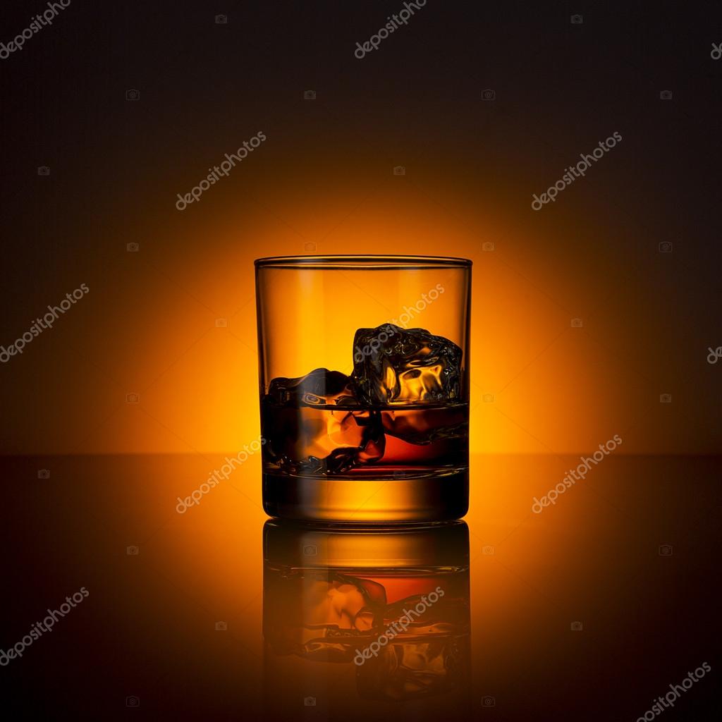 Whiskey glass ice cube drink bourbon summer sunset horizon rocks