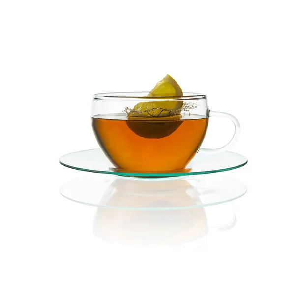 Tea lemon splash drink glass teacup isolated herbal tea hot drink cold-hot cutout — Stock Photo, Image