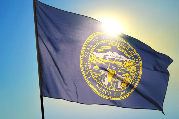 Nebraska State United States Flag Waving Wind Front Sun — Stock Photo, Image