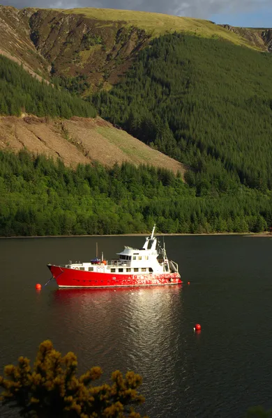 The red ship is in the harbor, Scotland