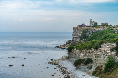 Image of Sea coast view with lighthouse on the rock. Stora Karlso, Gotland, Sweden.