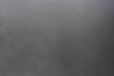 Arkaplan olarak, siyah deri dokusu kullanılır..