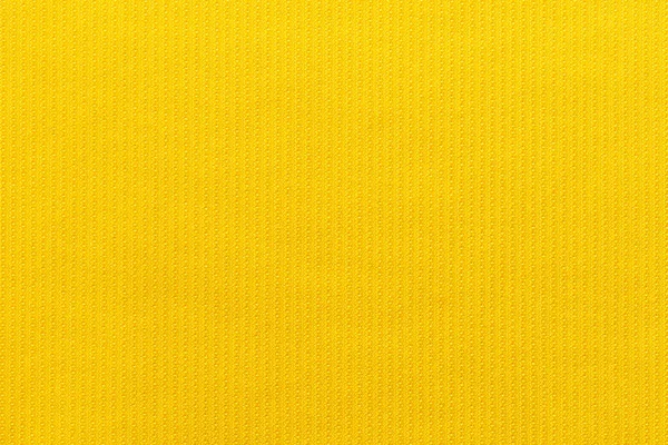 Sarı kumaş kumaş polyester doku ve tekstil arkaplan.