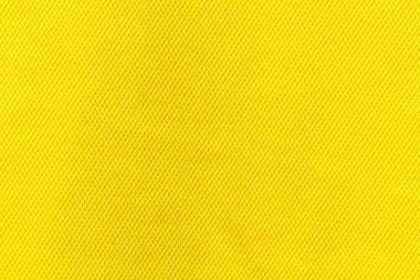 Sarı kumaş kumaş polyester doku ve tekstil arkaplan.