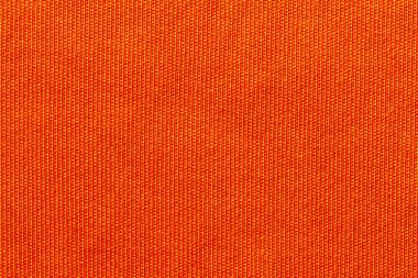 Turuncu renkli kumaş kumaş kumaş polyester doku ve tekstil arkaplan.