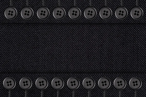 Black cotton texture with buttons — Stock Photo, Image