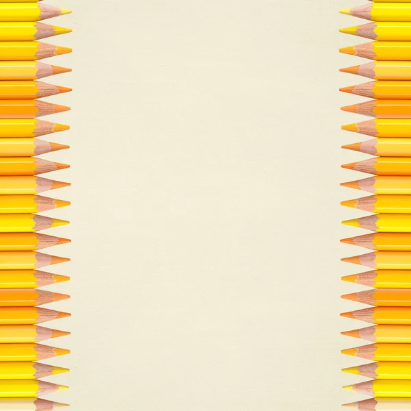 Paper background with yellow pencils — Stock Photo, Image