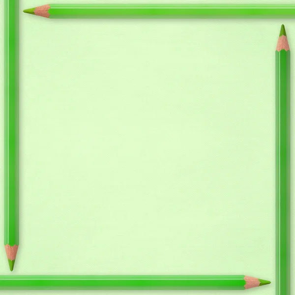 Green pencils on paper background — Stock Photo, Image