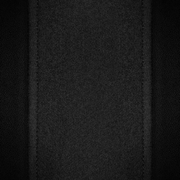 Grey canvas background on black leather — Stock Photo, Image