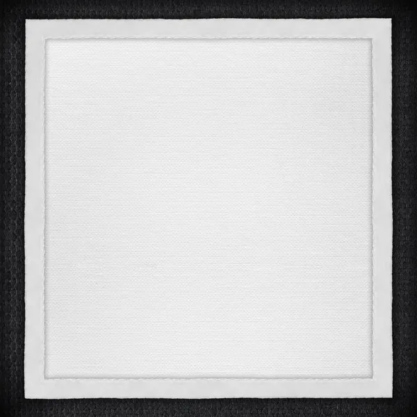 Witboek achtergrond in witte canvas frame — Stockfoto