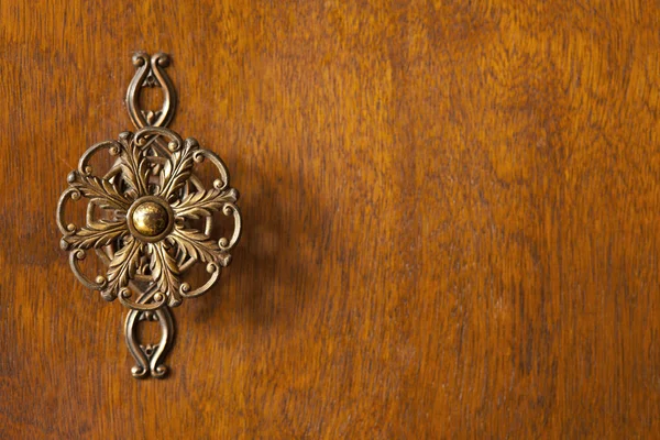 Detail of wardrobe door with decorative knob — Stock Photo, Image